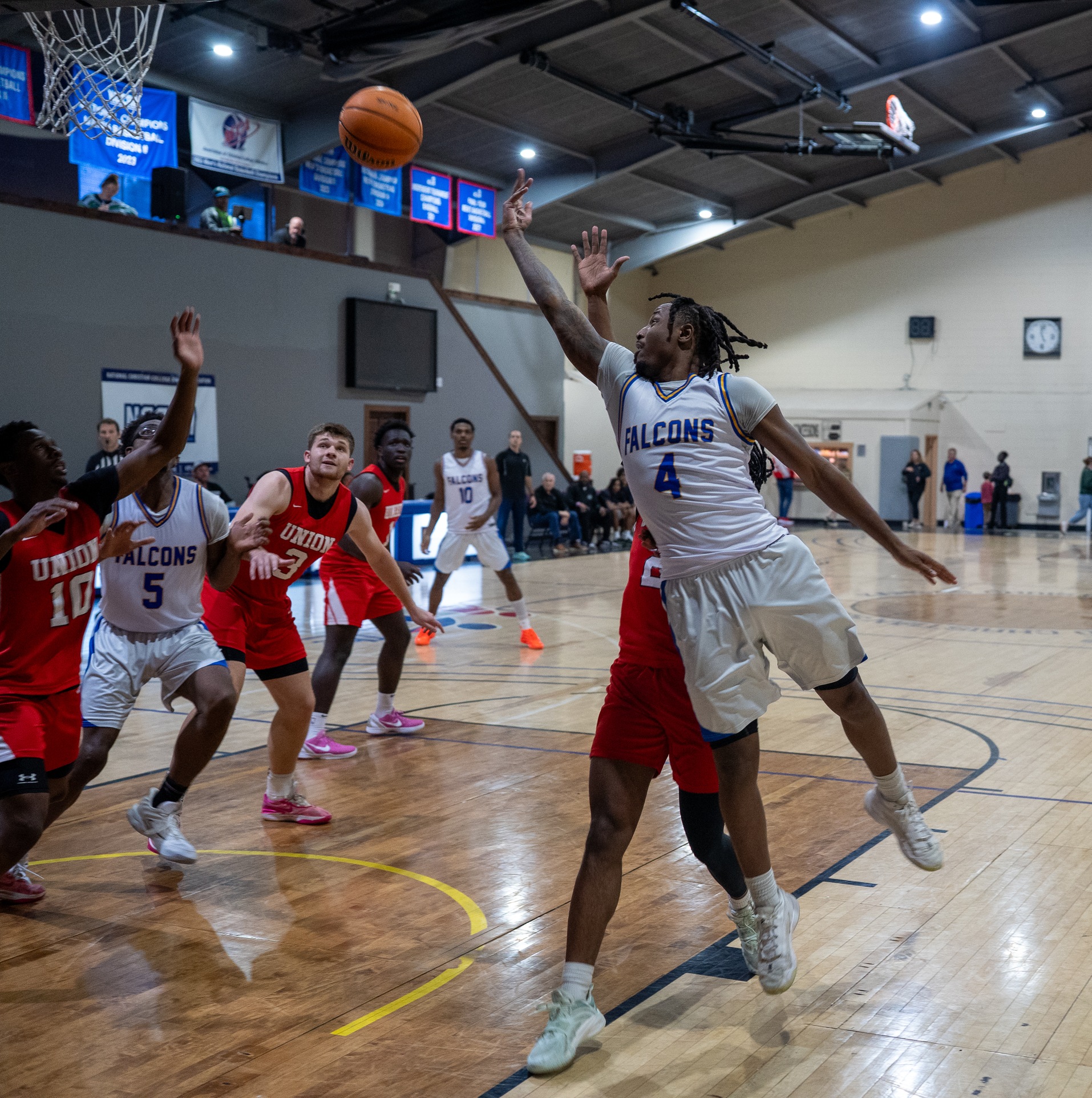 Falcons Beat Barclay, James Lewis Honored