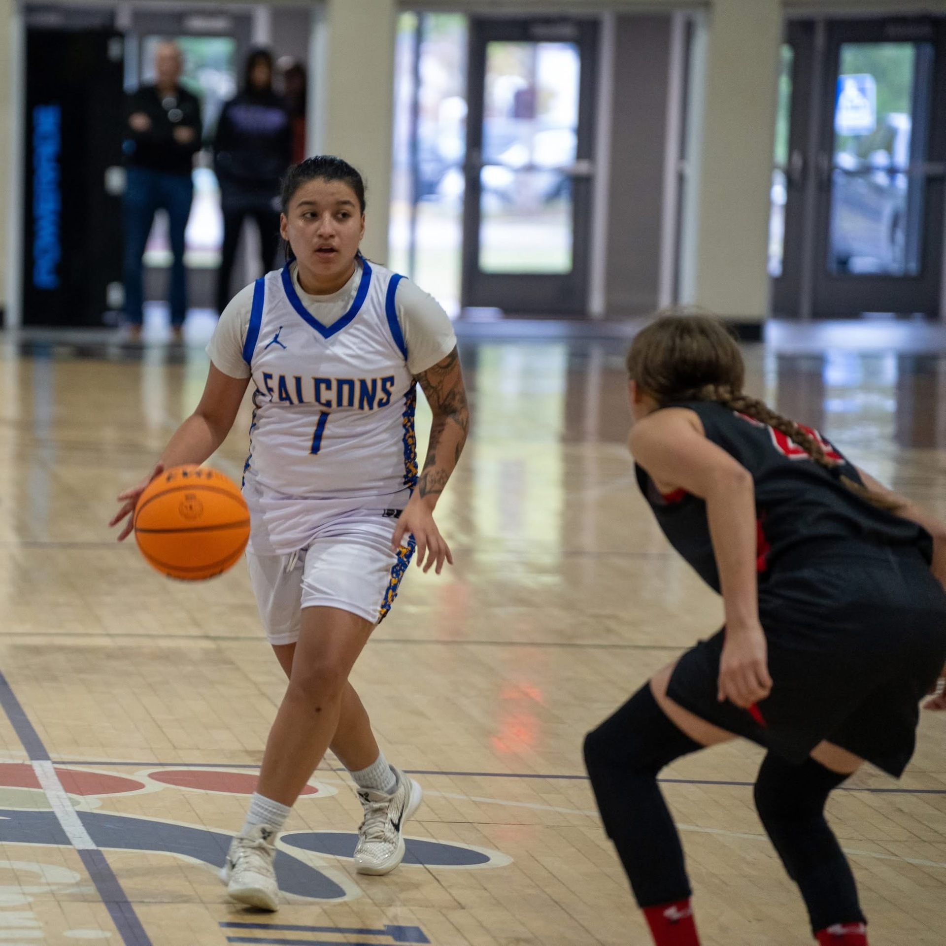 Lady Falcons Fly Over Warriors in Home Opener